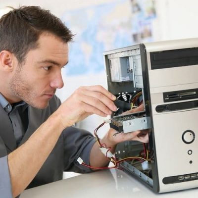 technician-fixing-computer-e1552084698792